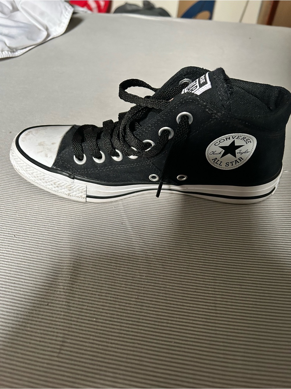Converse women’s Black & White High Top Sneakers